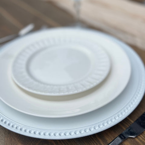 white dinner plates - available to rent by the Wildflower Denver, the premier wedding and event rental vendor. 